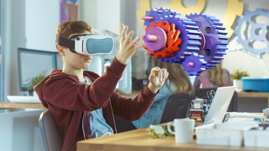 a boy wearing virtual reality goggles